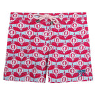 Boys swimming shorts in Guava red print by Lotty B Mustique resort wear