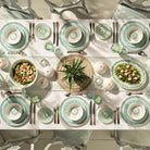 Set the table with fine bone china dinner plates in Mustique Island design by Lotty B