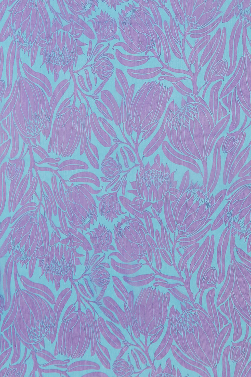 Protea print in violet and turquoise blue hand screen printed onto chiffon silk by designer Lotty B Mustique