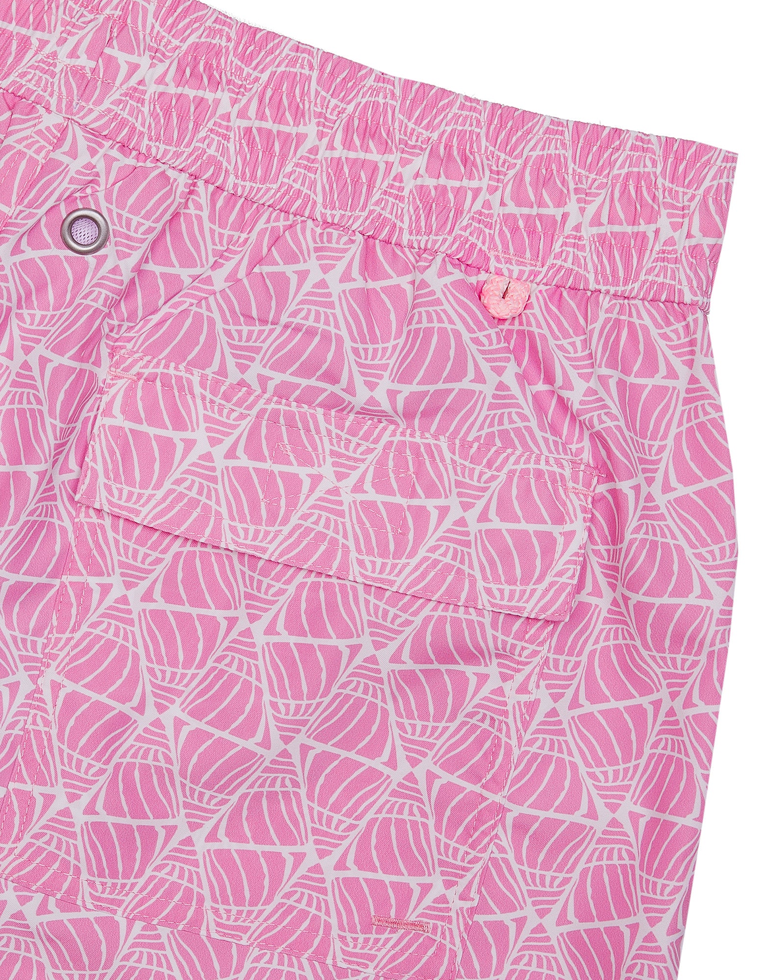 Back pocket detail of mens swim shorts in pink Shelltop print by Pink House Mustique