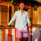 Mens designer swim wear Guava red print by Lotty B Mustique at Basils Bar