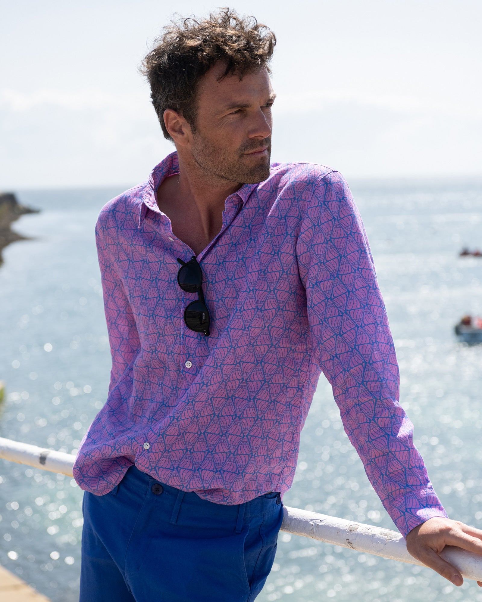 Holiday style men's linen shirt in blue and pink Shelltop print