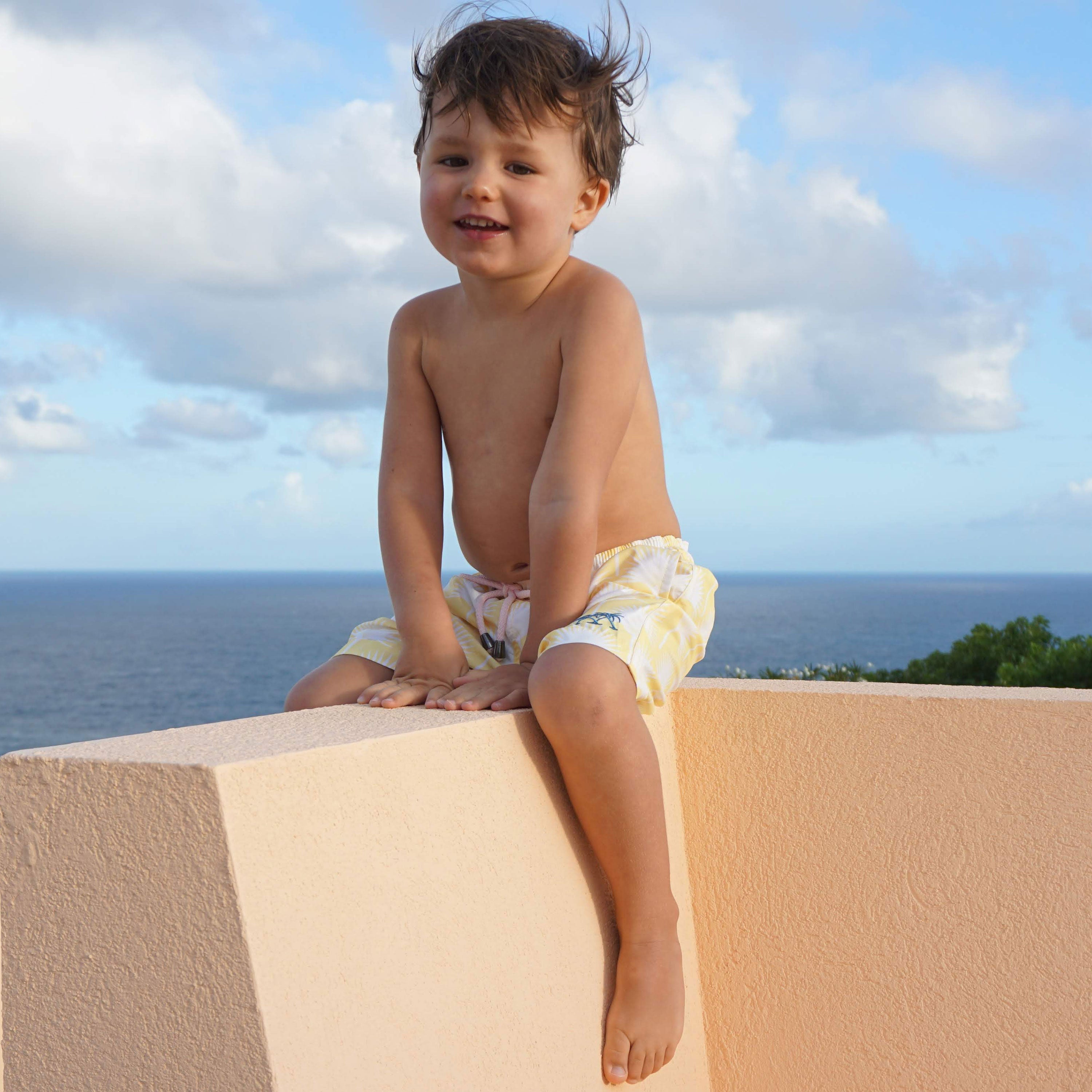 Boys swim trunks : FAN PALM - YELLOW childrens designer swimwear Mustique