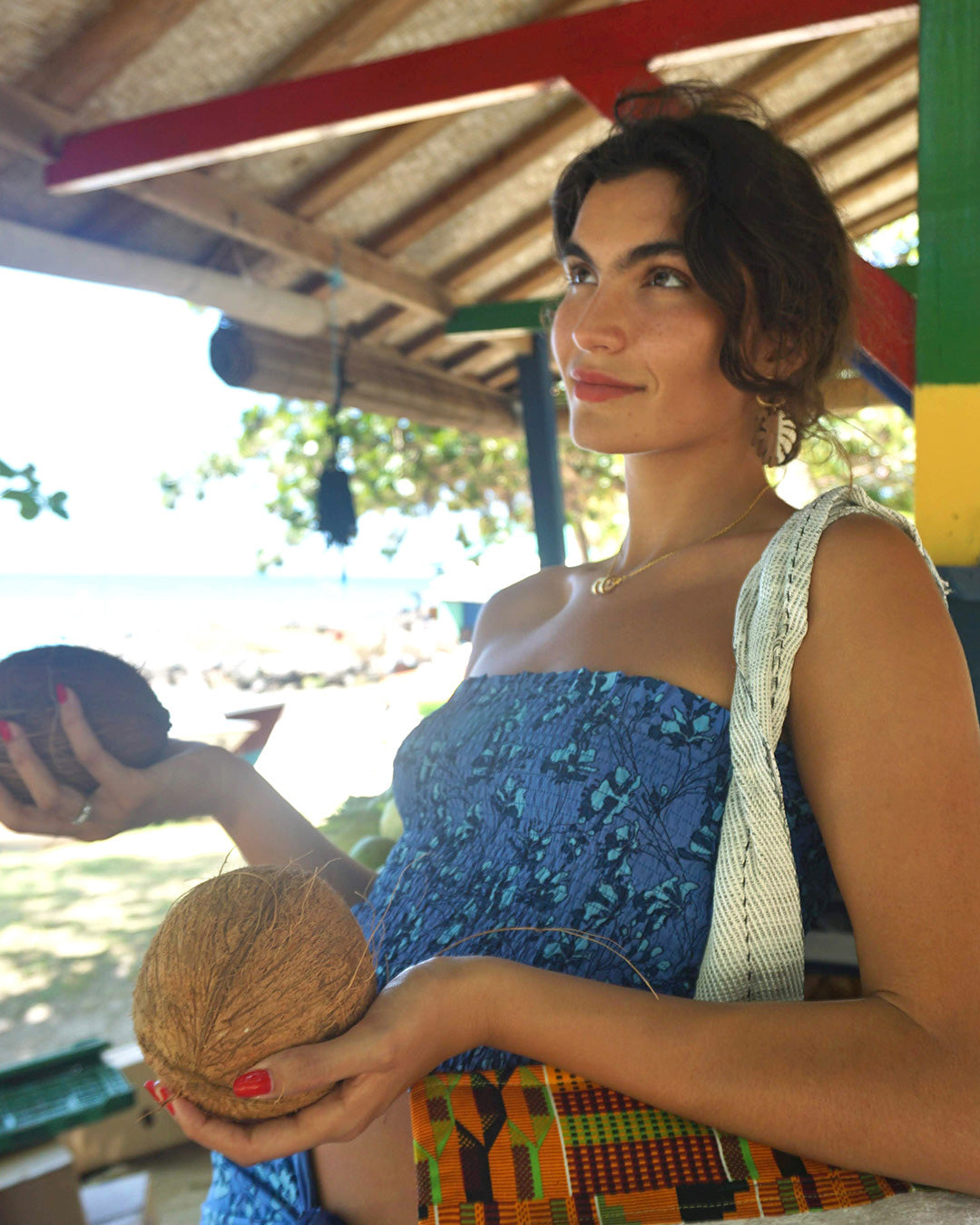 Holiday shopping style silk shirred bandeau top in blue floral Flamboyant Flower print by designer Lotty B Mustique