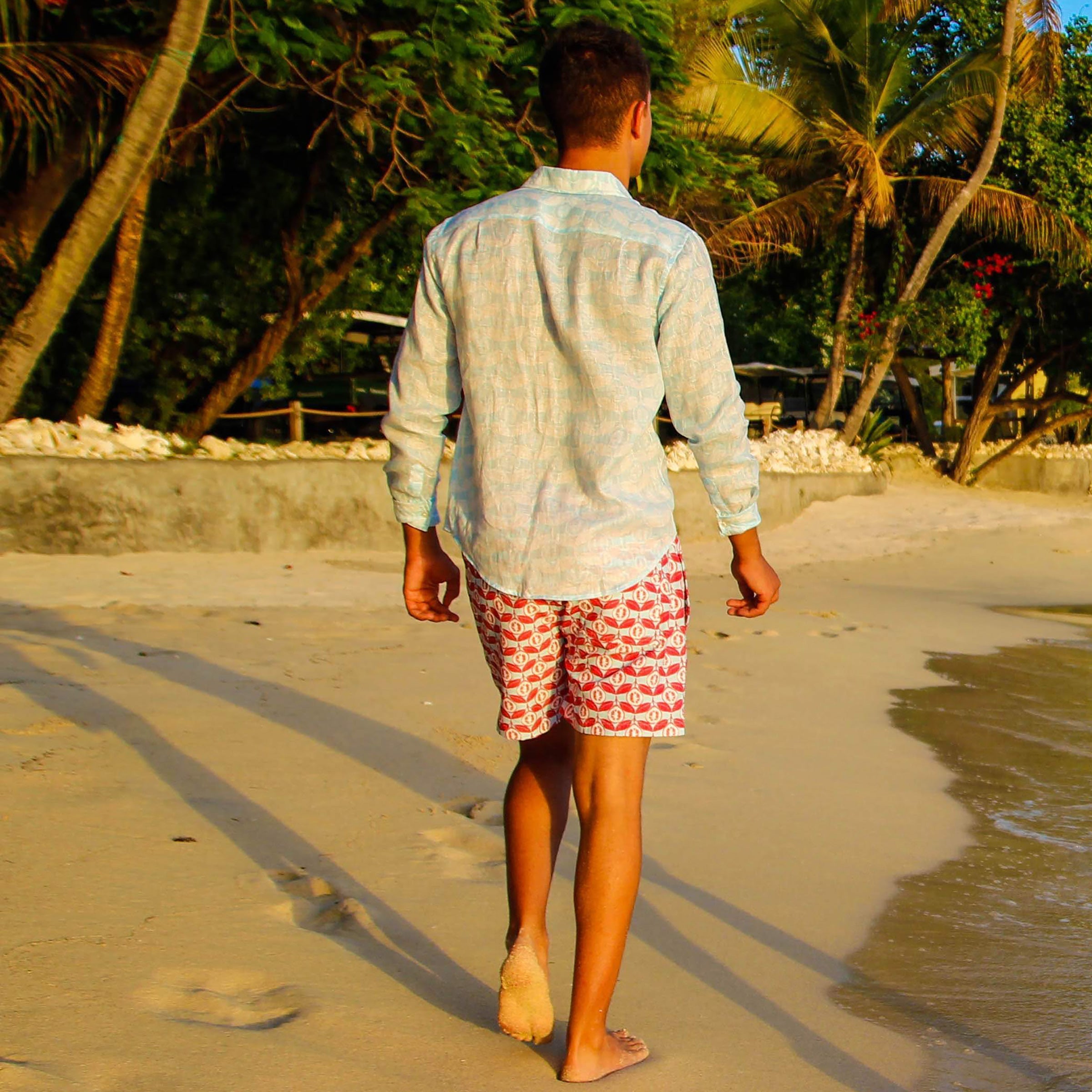 Mens designer swim wear Guava red print by Lotty B Mustique beach style