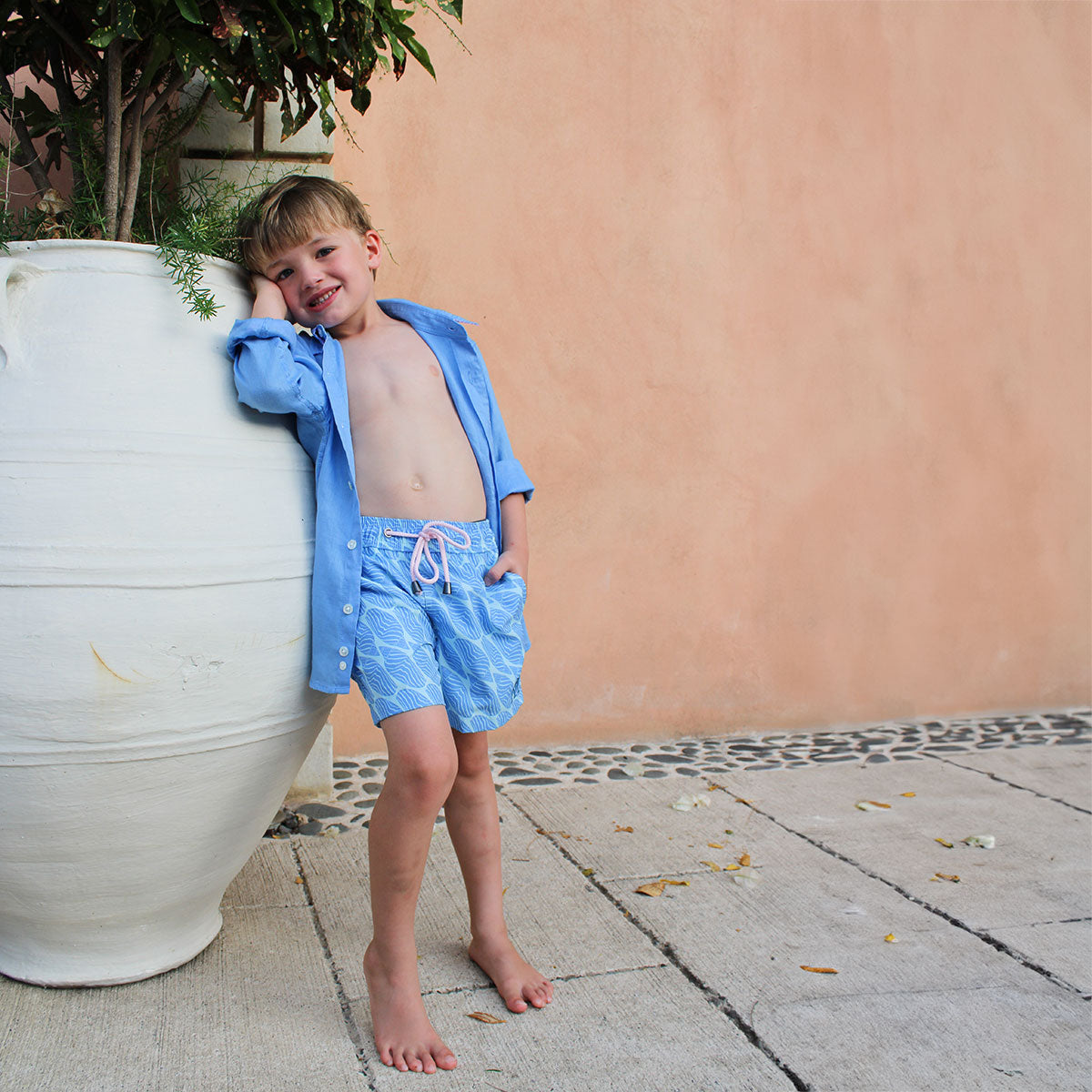 Kid's vacation packing essentials French blue linen shirt & swim shorts in blue Striped Shell print by designer Lotty B