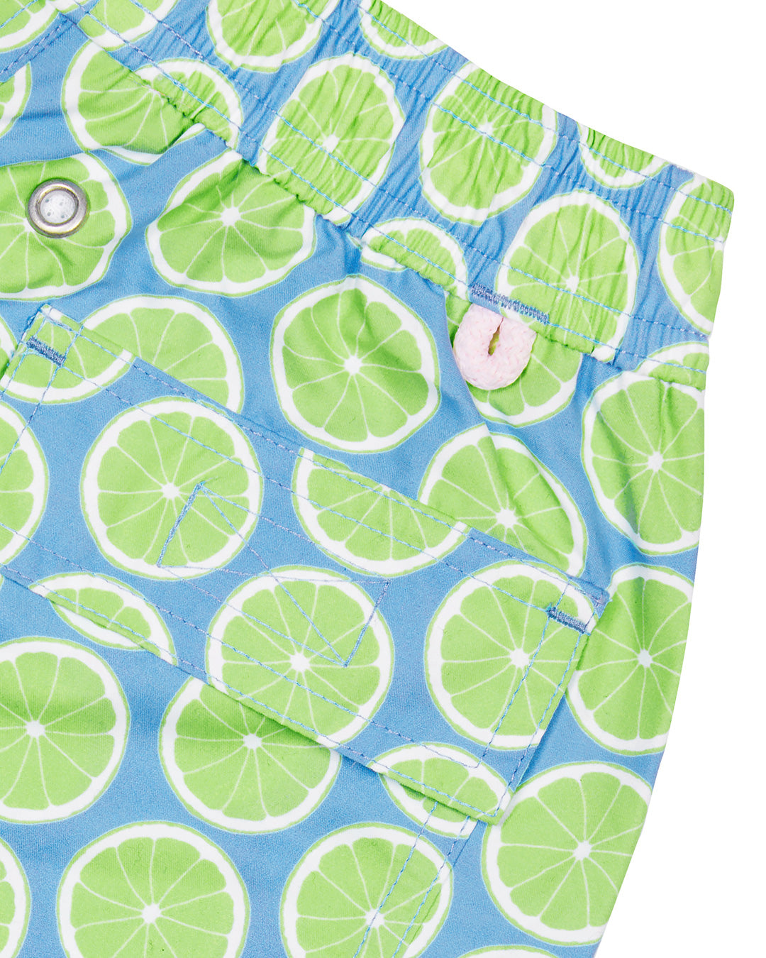 Back pocket and waistband detail if kid's recycled fabric blue swim shorts with green Lime Slice print by Lotty B for Pink House