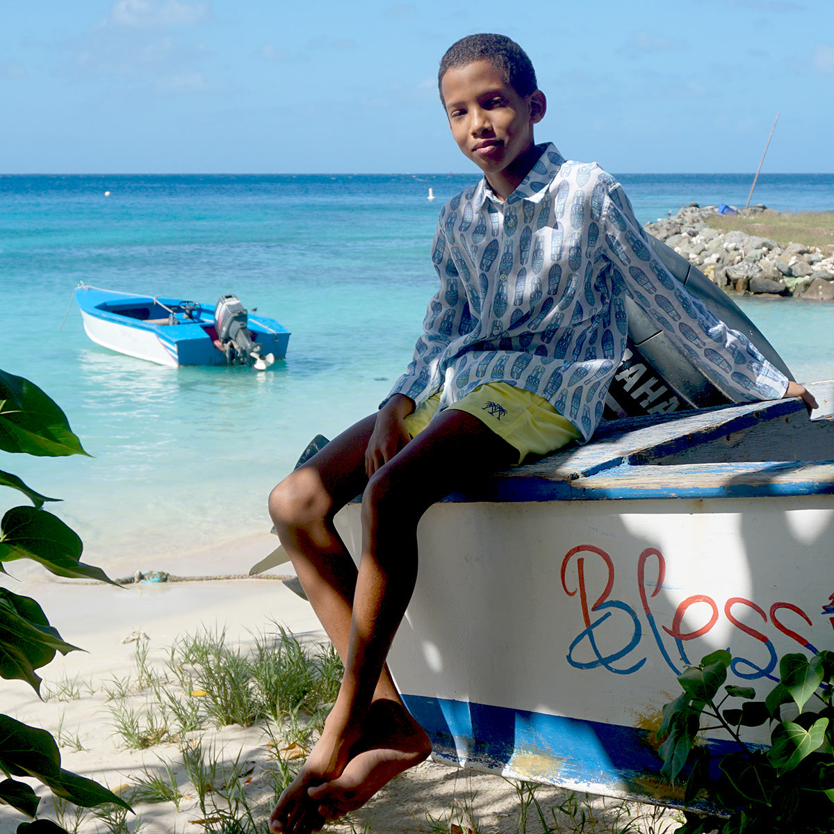 Kids linen beach holiday shirt in blue Riva boat print by Pink House