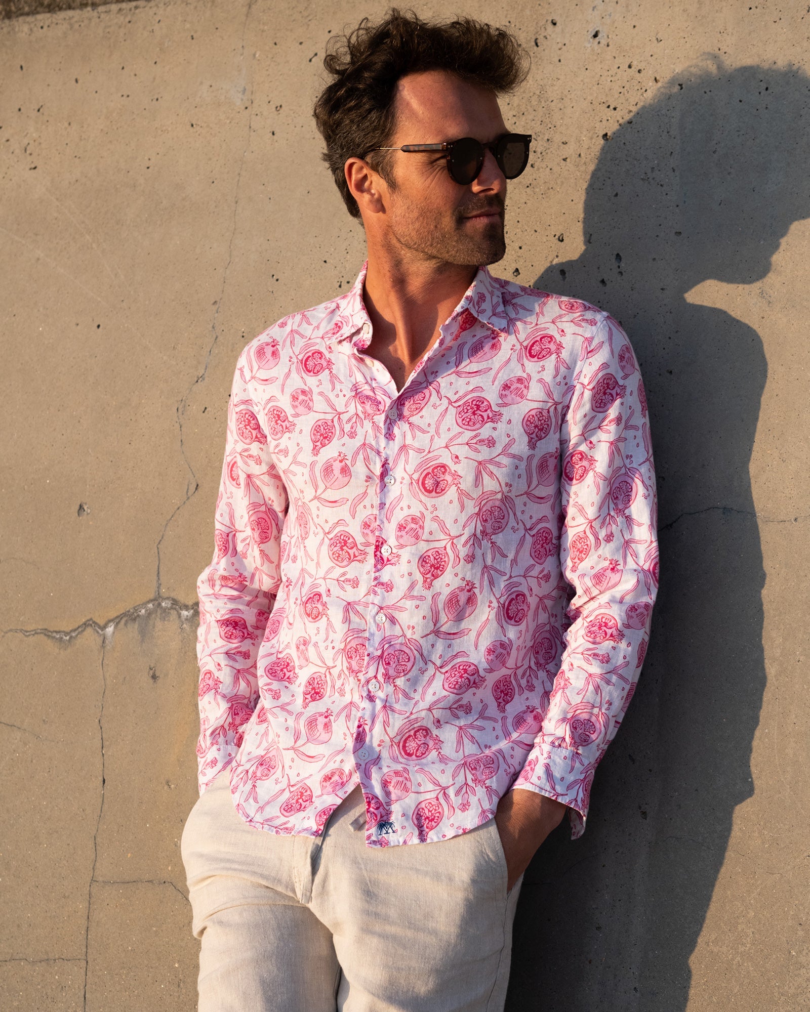 Vacation style mens linen shirt in Pomegranate pink print by designer Lotty B