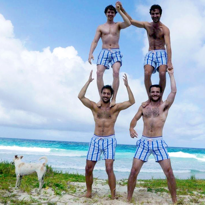 Pink House swim shorts in navy blue stripe print by Lotty B, beach fun Mustique style