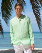 Mens Short Collar Linen Shirt : Pistachio Green perfectly paired with white linen trousers by Lotty B Mustique lifestyle