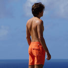 Mens quick dry orange swim trunks by designer Lotty B Mustique for Pink House summer essentials