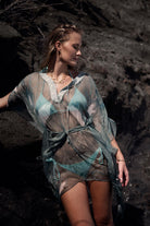 Tropical resort holiday fashion, chiffon silk Cosima Kaftan in lichen green Egret design, Cotton House beach, Mustique