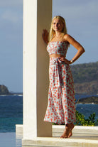 Silk Gabija Palazzo Pants: FLAMBOYANT FLOWER - ORANGE wide leg trousers designed by Lotty B Mustique resort wear